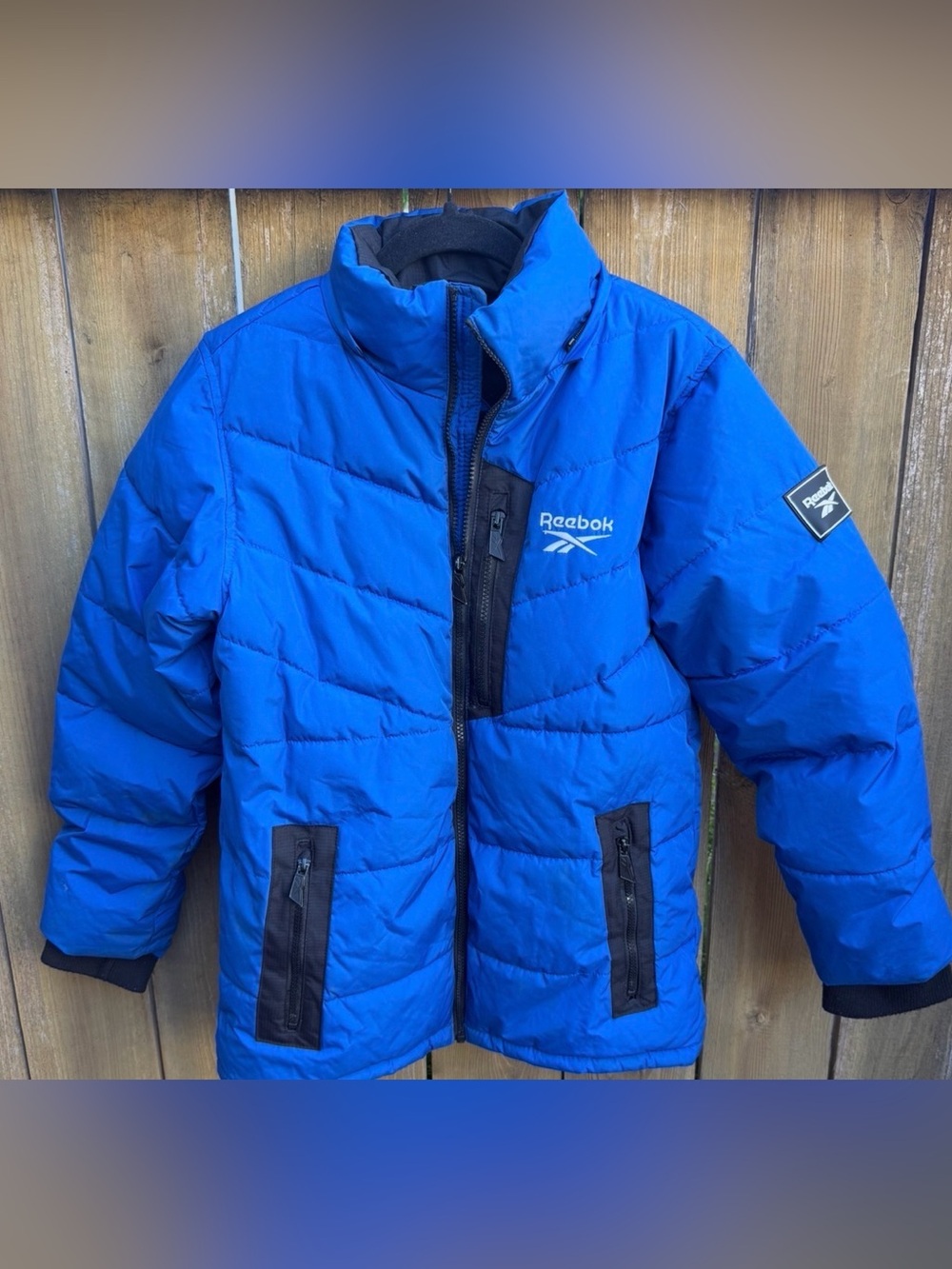 Reebok Bright Blue Kids Puffer Jacket with Black Trim size Large 14/16